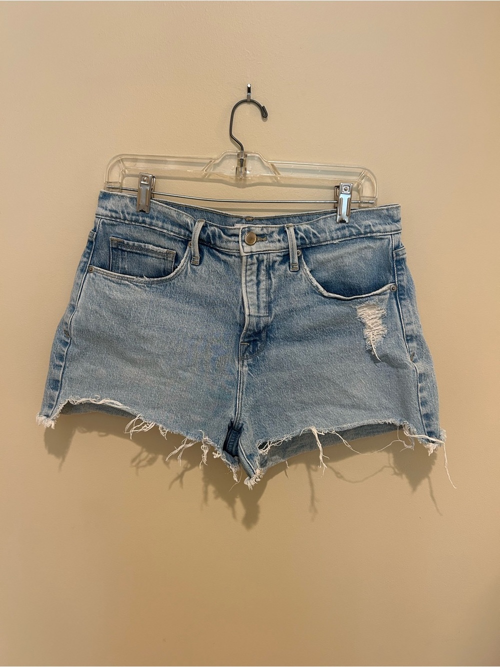 Good American Light Wash Distressed Denim Shorts